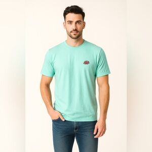 UO Turquoise Shirt with Pink Lotus Flower Logo
